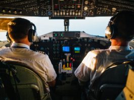 two pilots flying an airplane